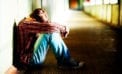 Depressed young man contemplating suicide Canada mishandling mental illness crisis