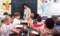 Teacher students school elementary classroom Promote equity by promoting a quality education